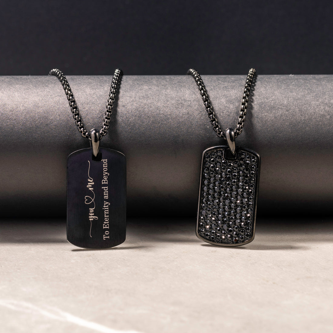 Engraved men's tag necklace in black stainless steel with custom text