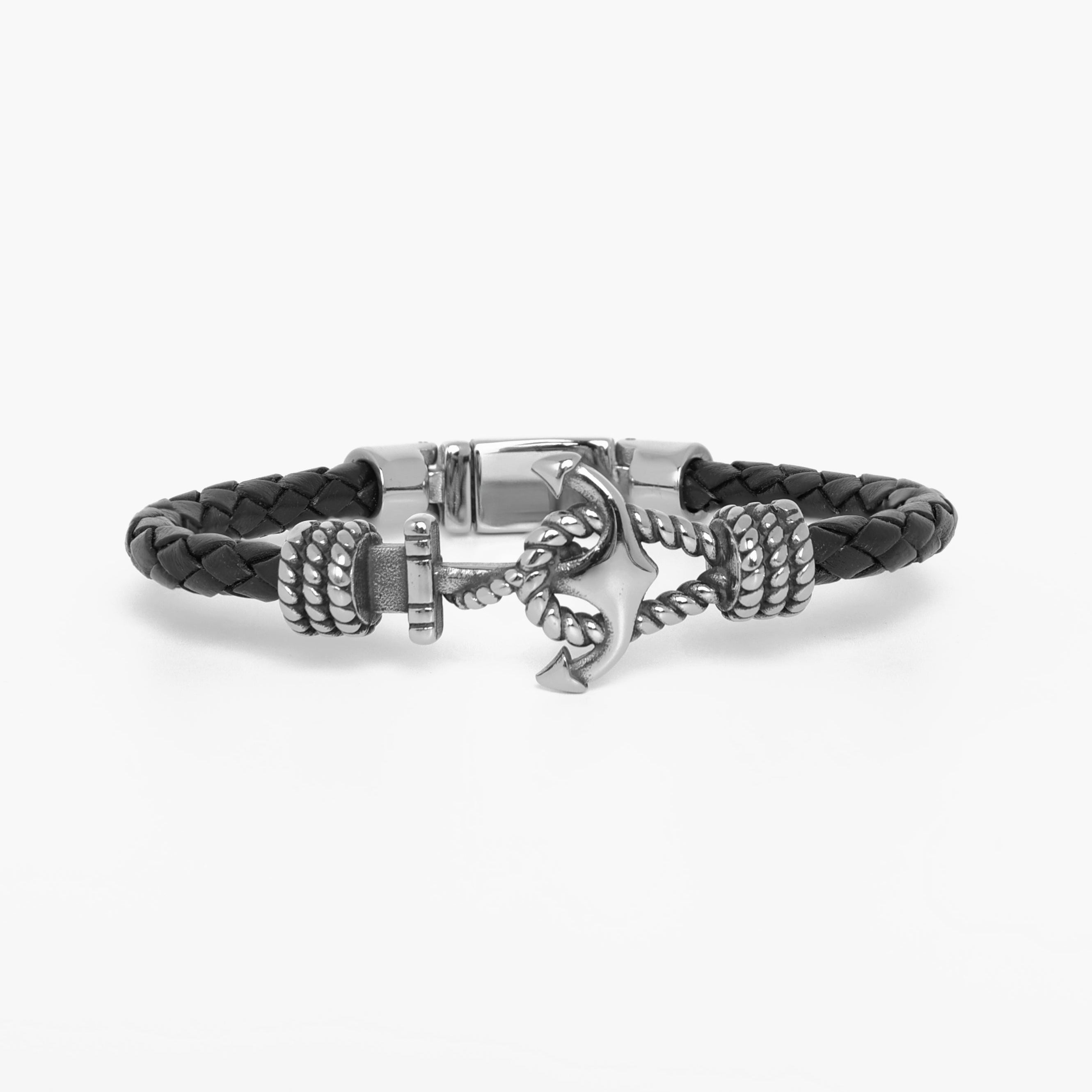 A black braided leather bracelet with a silver-toned anchor charm and textured rope details, displayed on a clean white background.