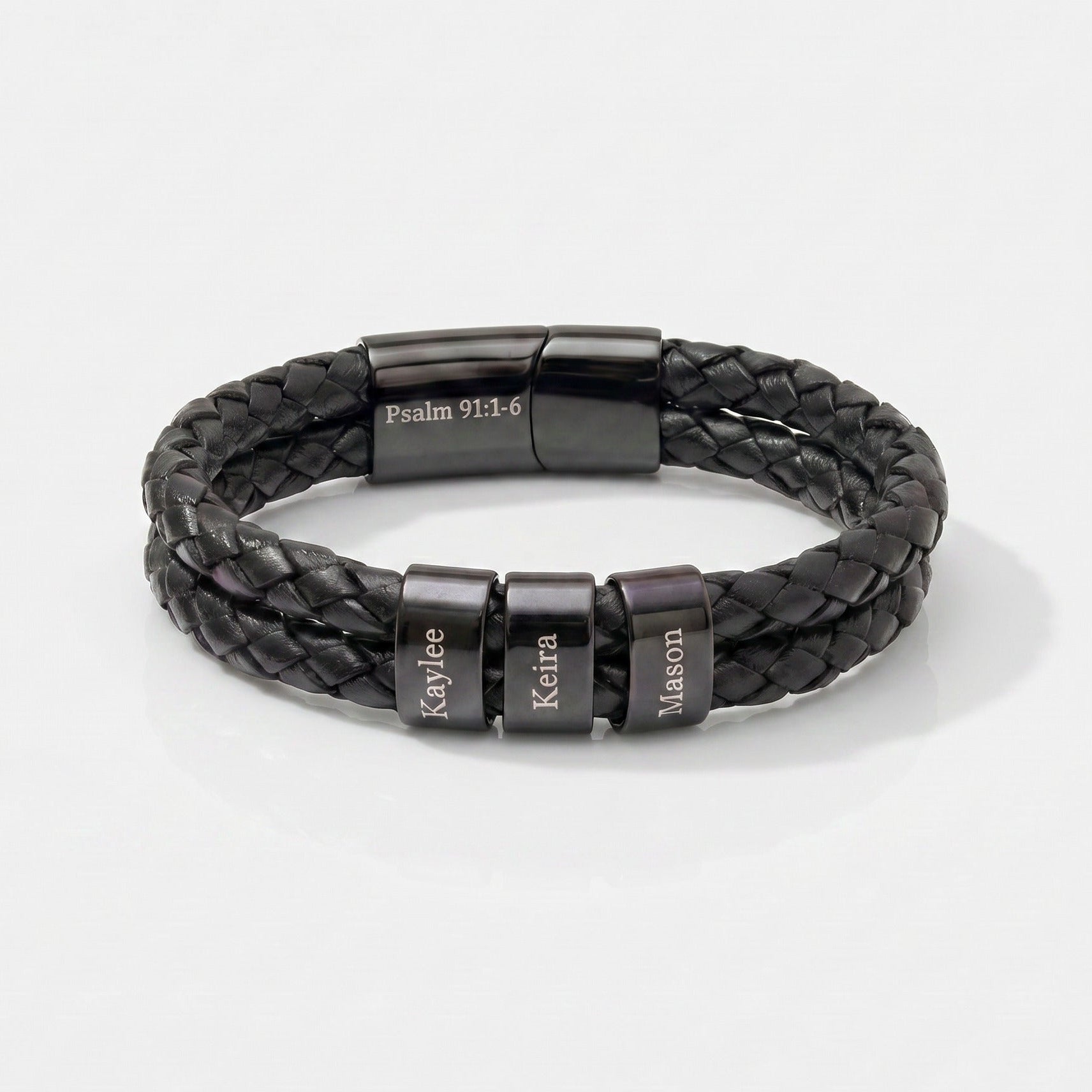 Black braided leather bracelet with engraved names on a white background