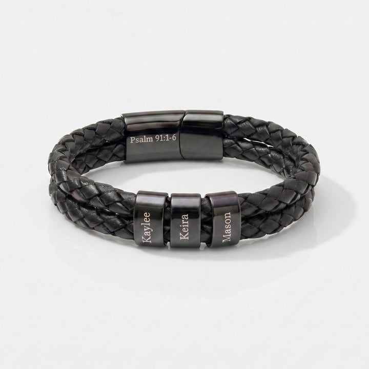 Black braided leather bracelet with engraved names on a white background