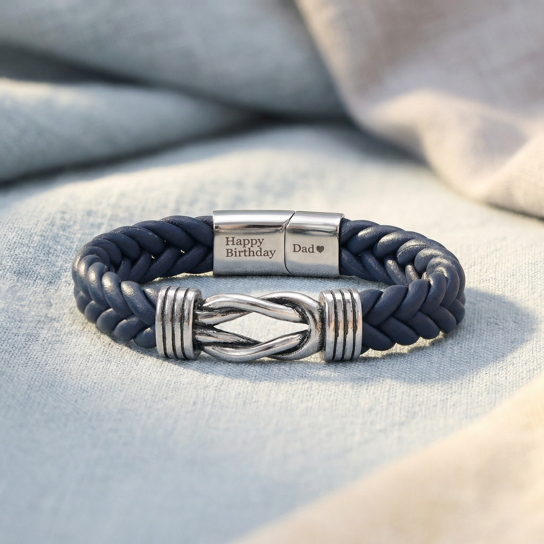 leather bracelet on a blue fabric