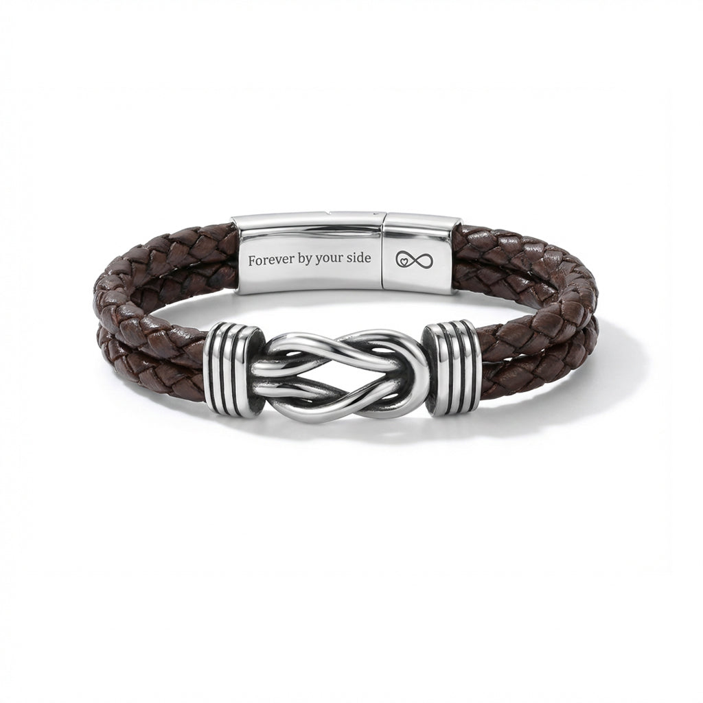 Brown braided leather bracelet with silver metal clasp on a white background