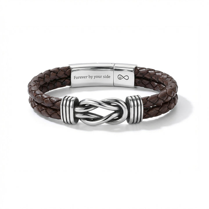 Brown braided leather bracelet with silver metal clasp on a white background