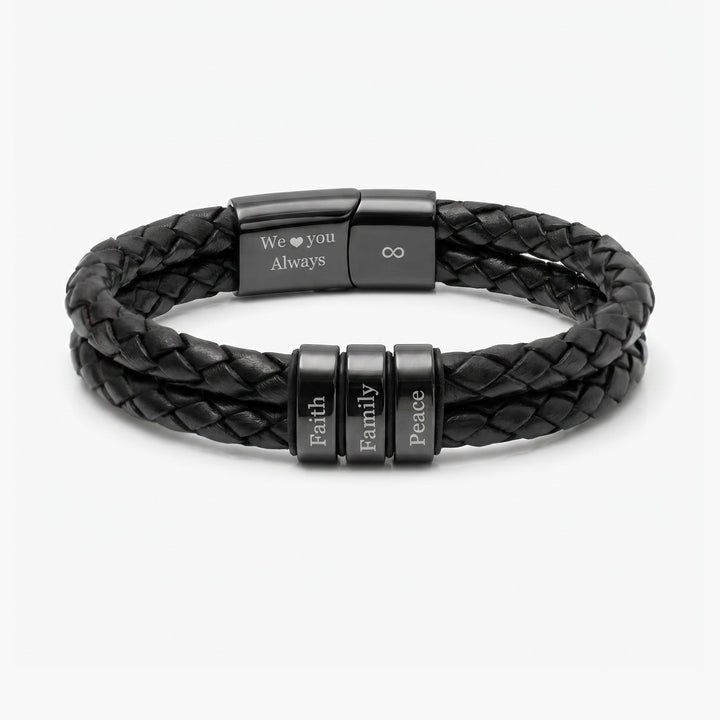 Black braided leather bracelet with engraved text on a white background