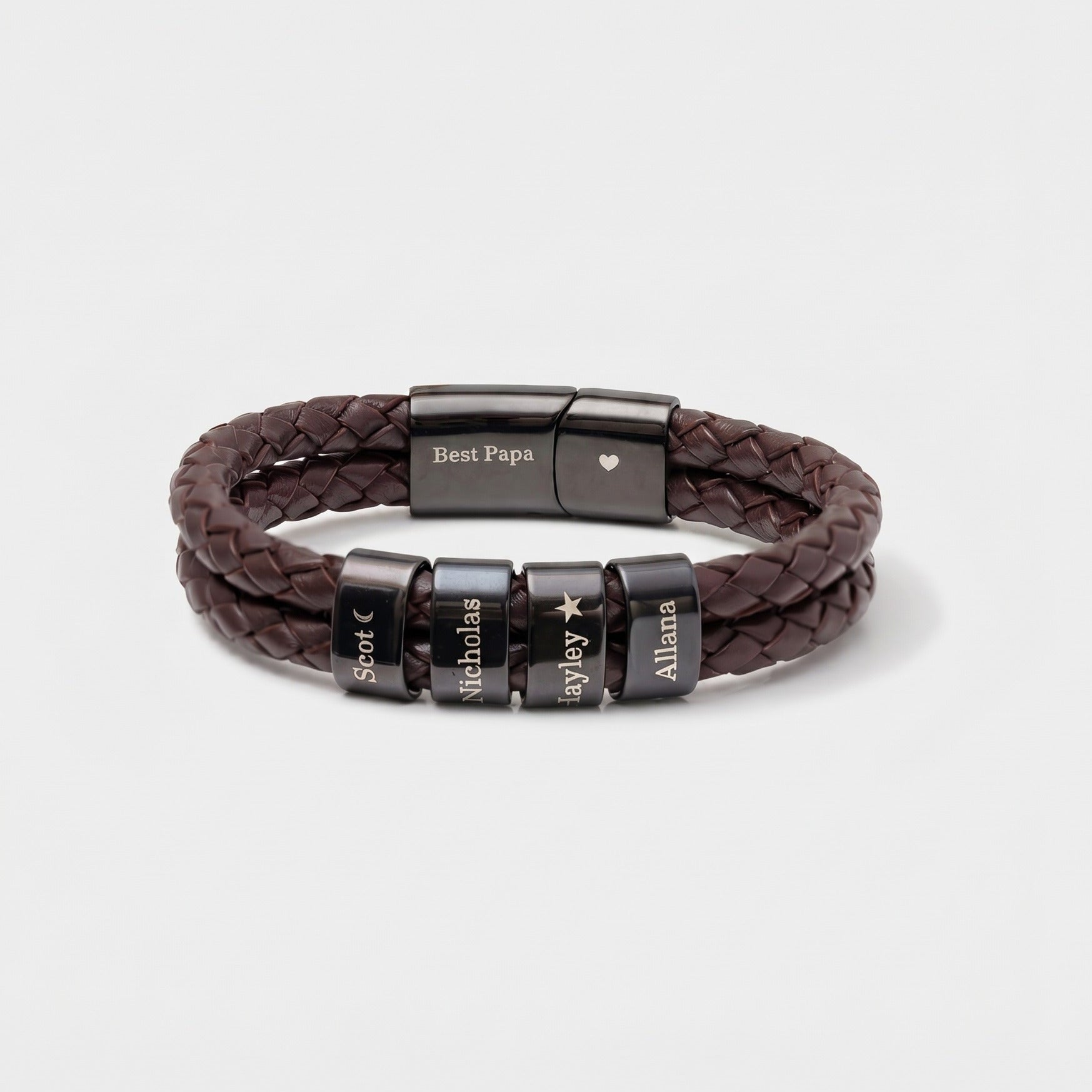 Brown braided leather bracelet with black engraved beads on a white background