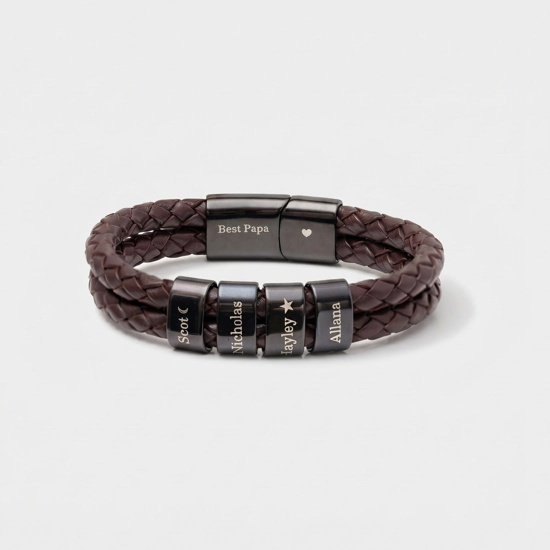 Brown braided leather bracelet with black engraved beads on a white background