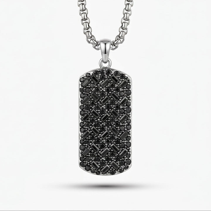 Titanium-necklace with a black diamond-studded pendant on a white background