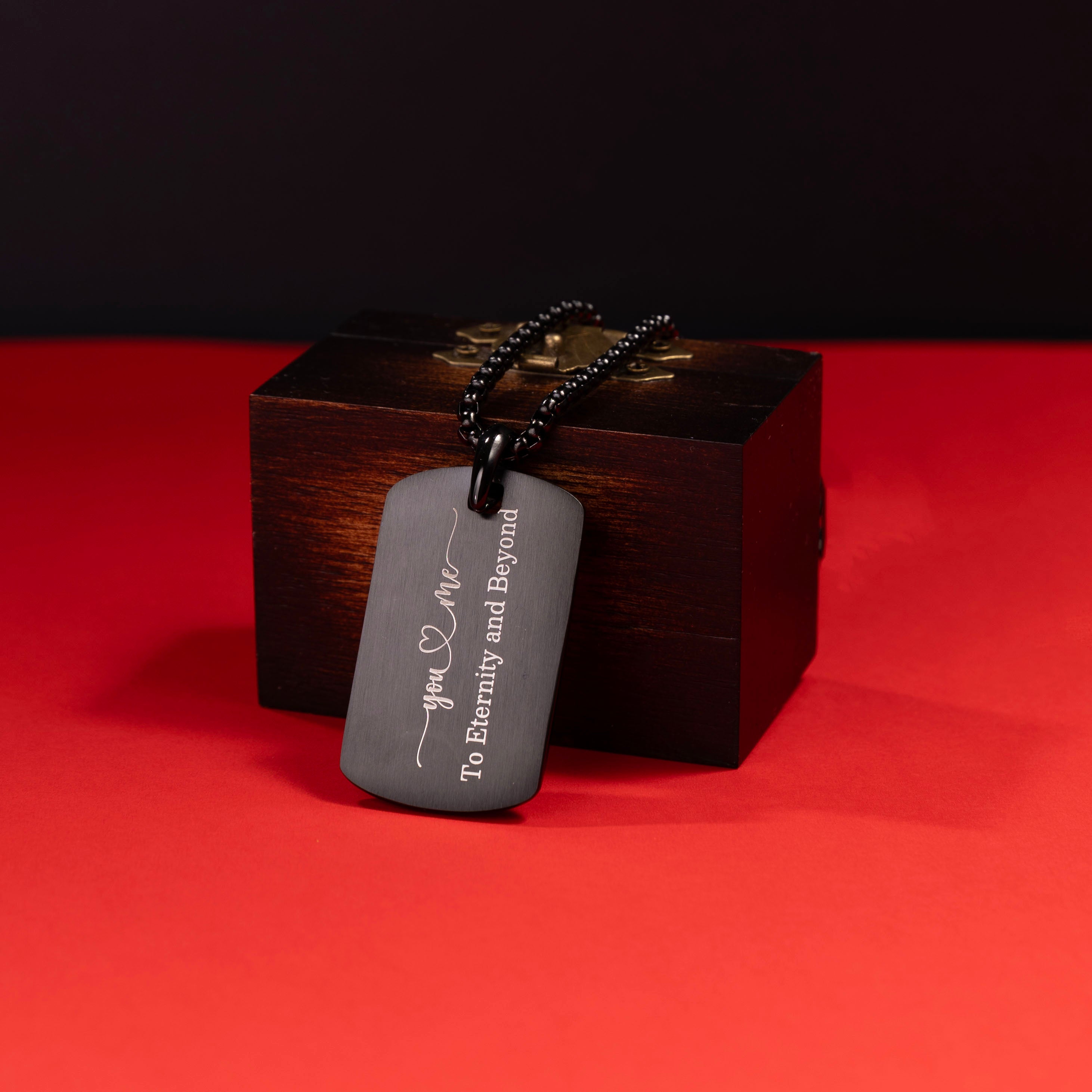 Custom men's necklace in silver with black diamond and engraved message
