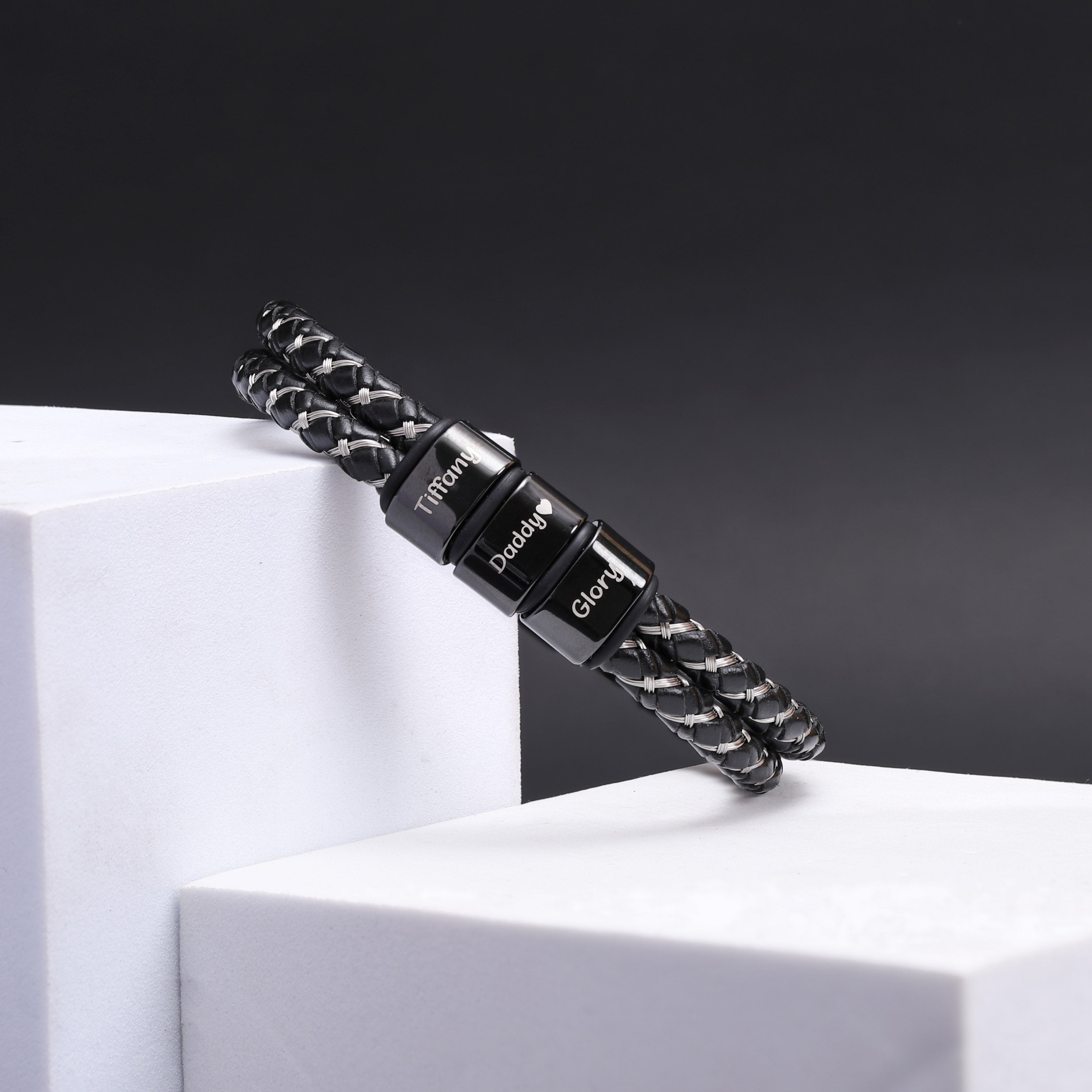 Custom family names engraved on a stylish leather bracelet for 