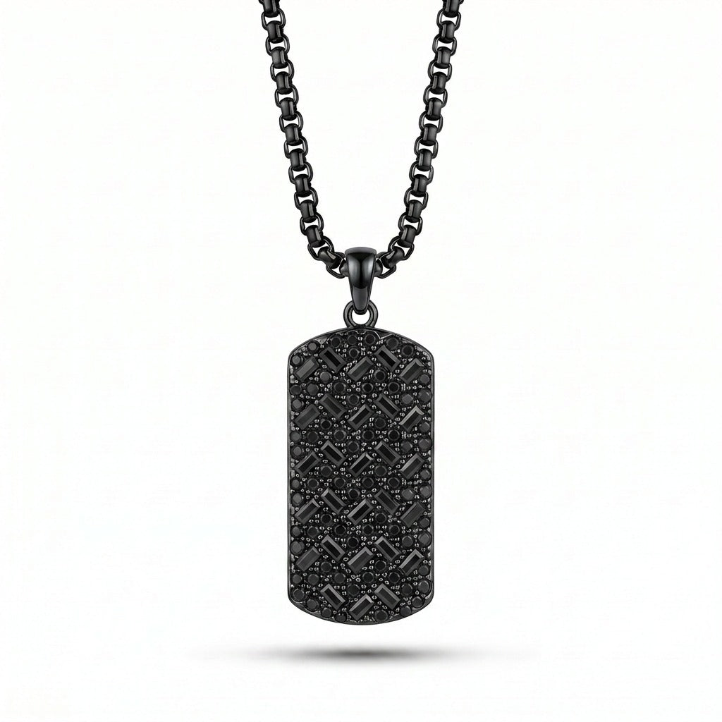 Black dog tag necklace on a white background