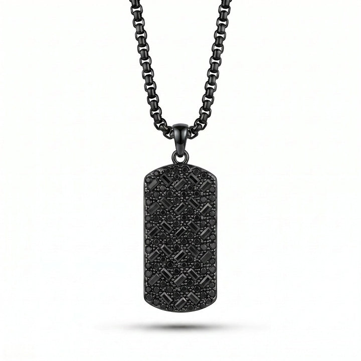 Black dog tag necklace on a white background