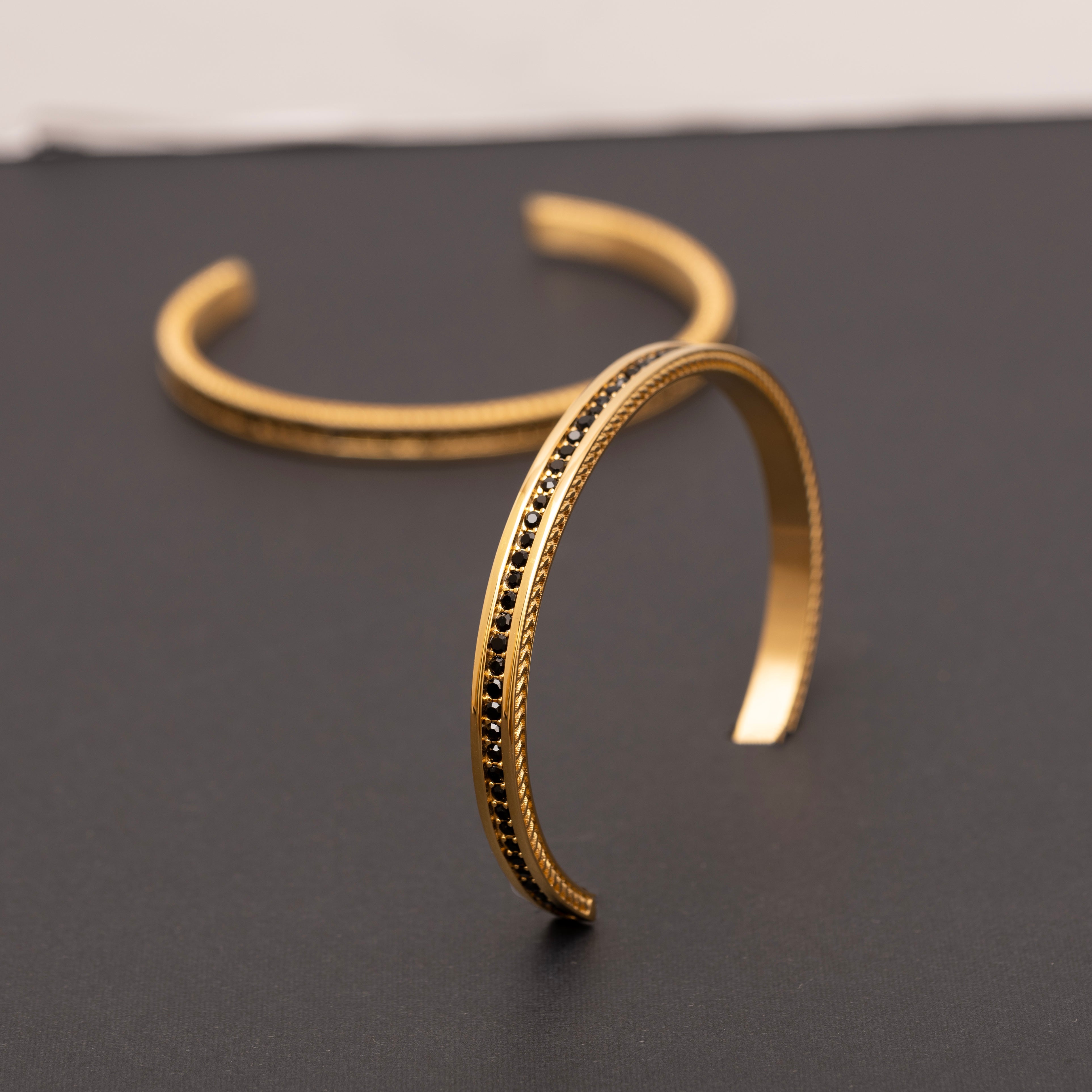 Engraved Gold Cuff Bracelet with Gemstones – Elegant gold cuff bracelet featuring custom engraving and sparkling pave gemstones for a refined look.

