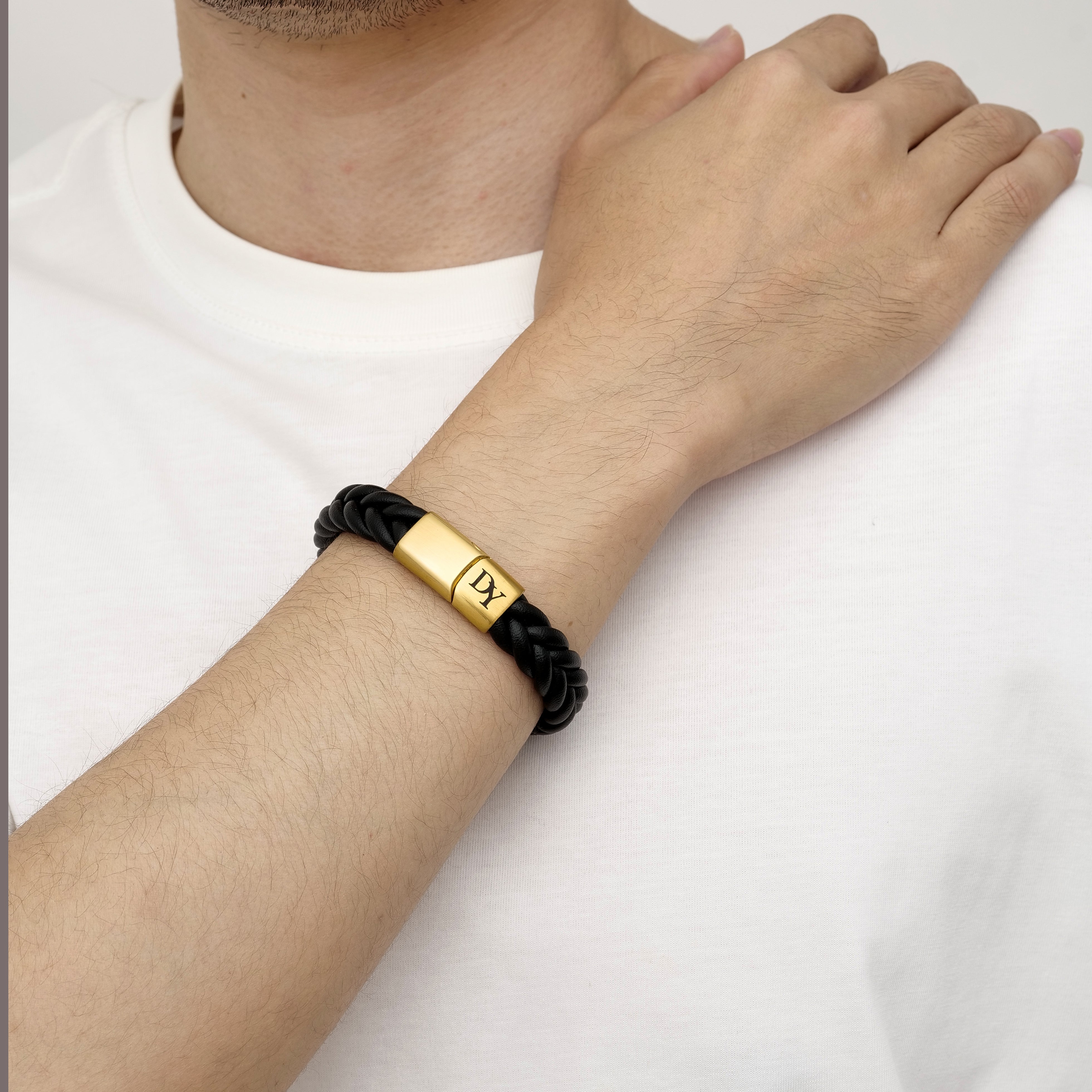 men’s leather band bracelet featuring a gold initial