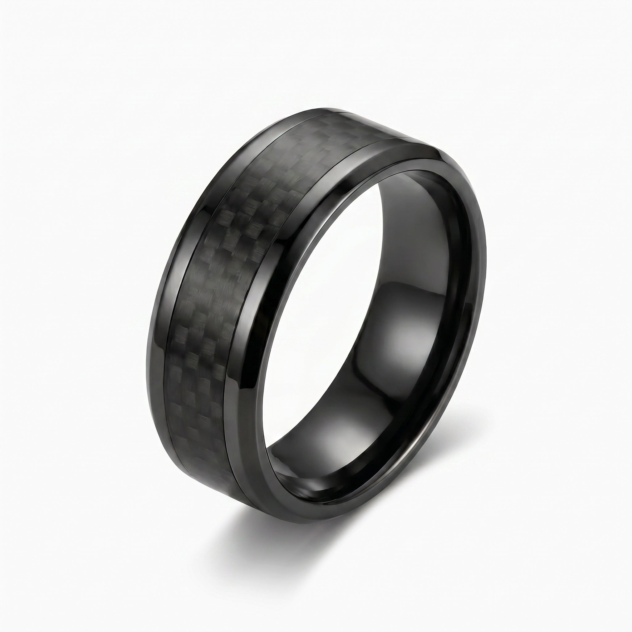 Black carbon fiber ring on a white background
