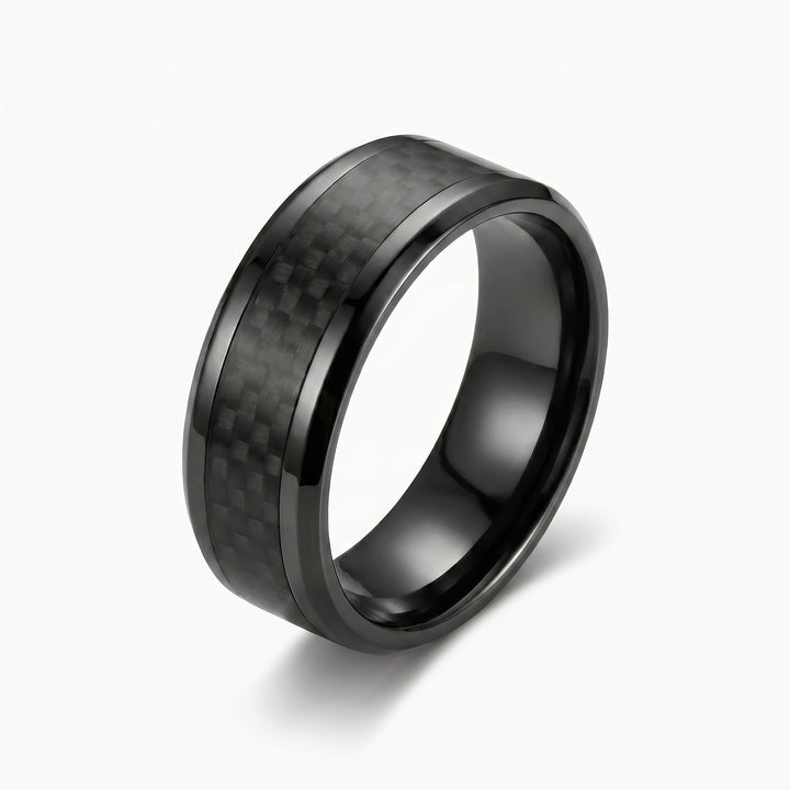 Black carbon fiber ring on a white background