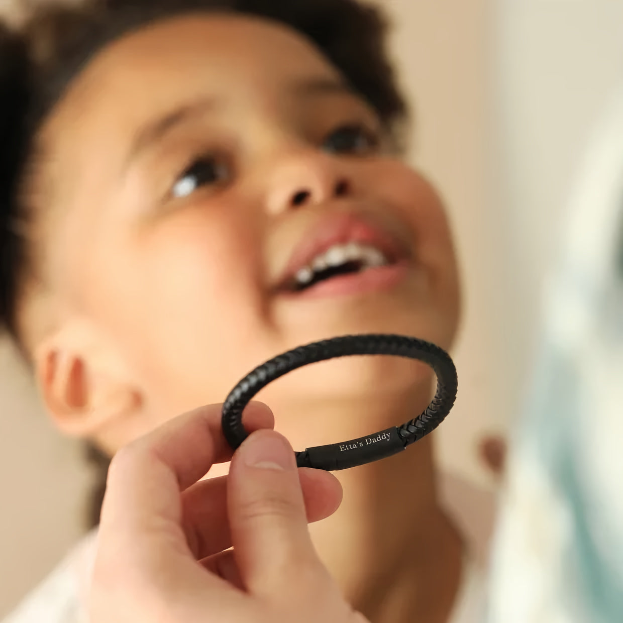 Men's bracelet with hidden engraving shown on wrist
