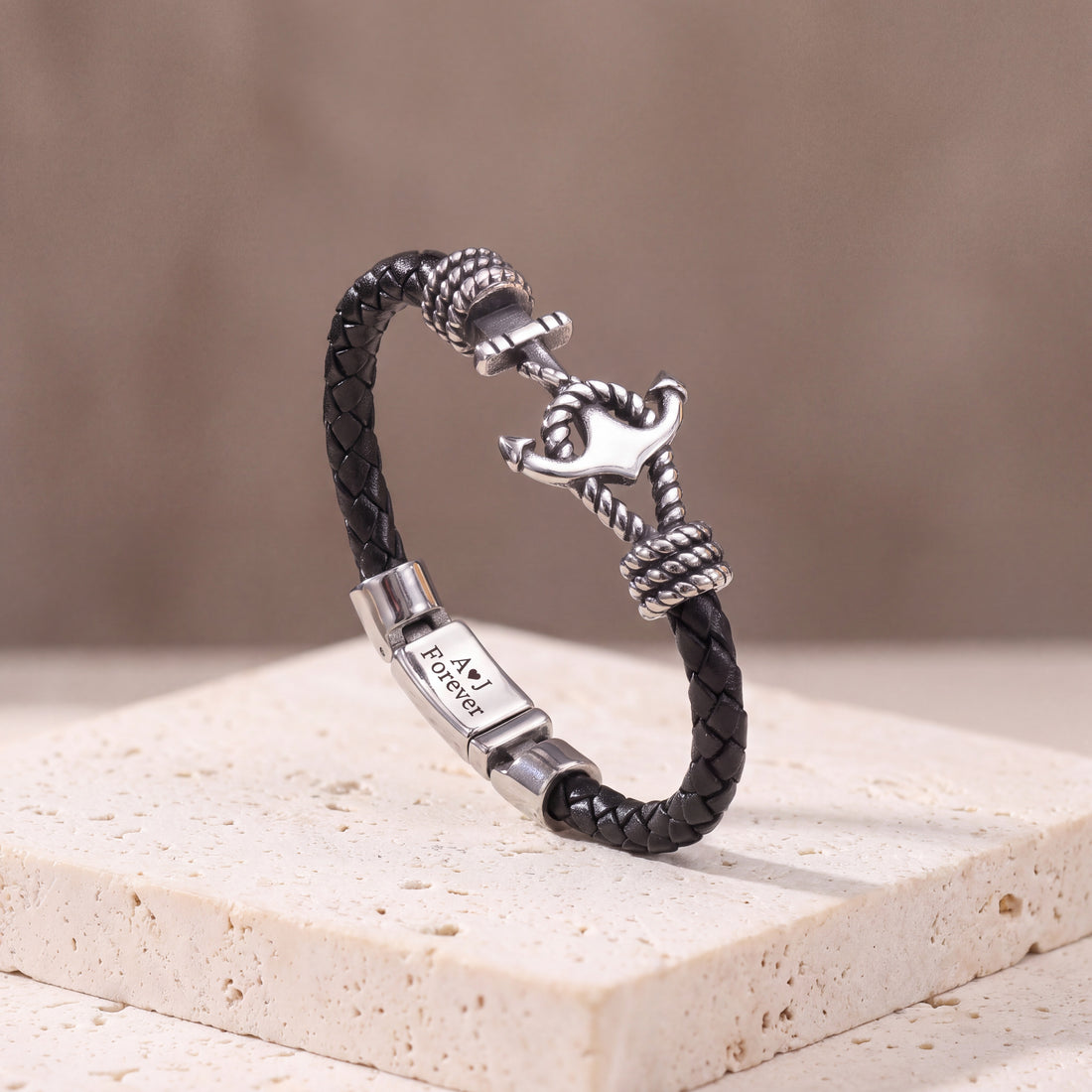The Mooring anchor bracelet in black and navy leather, side by side