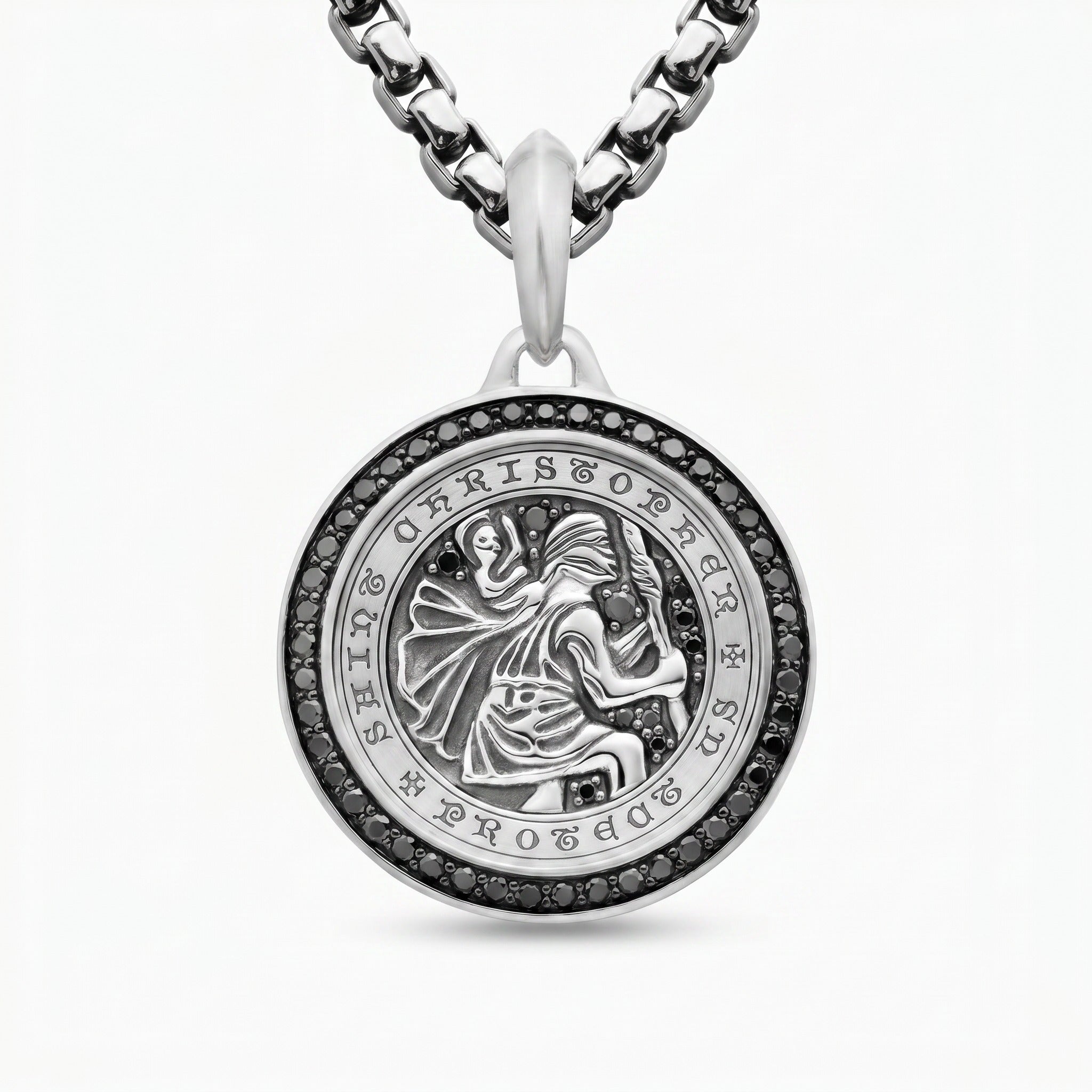 Silver ST. Christopher pendant necklace with intricate design on a white background