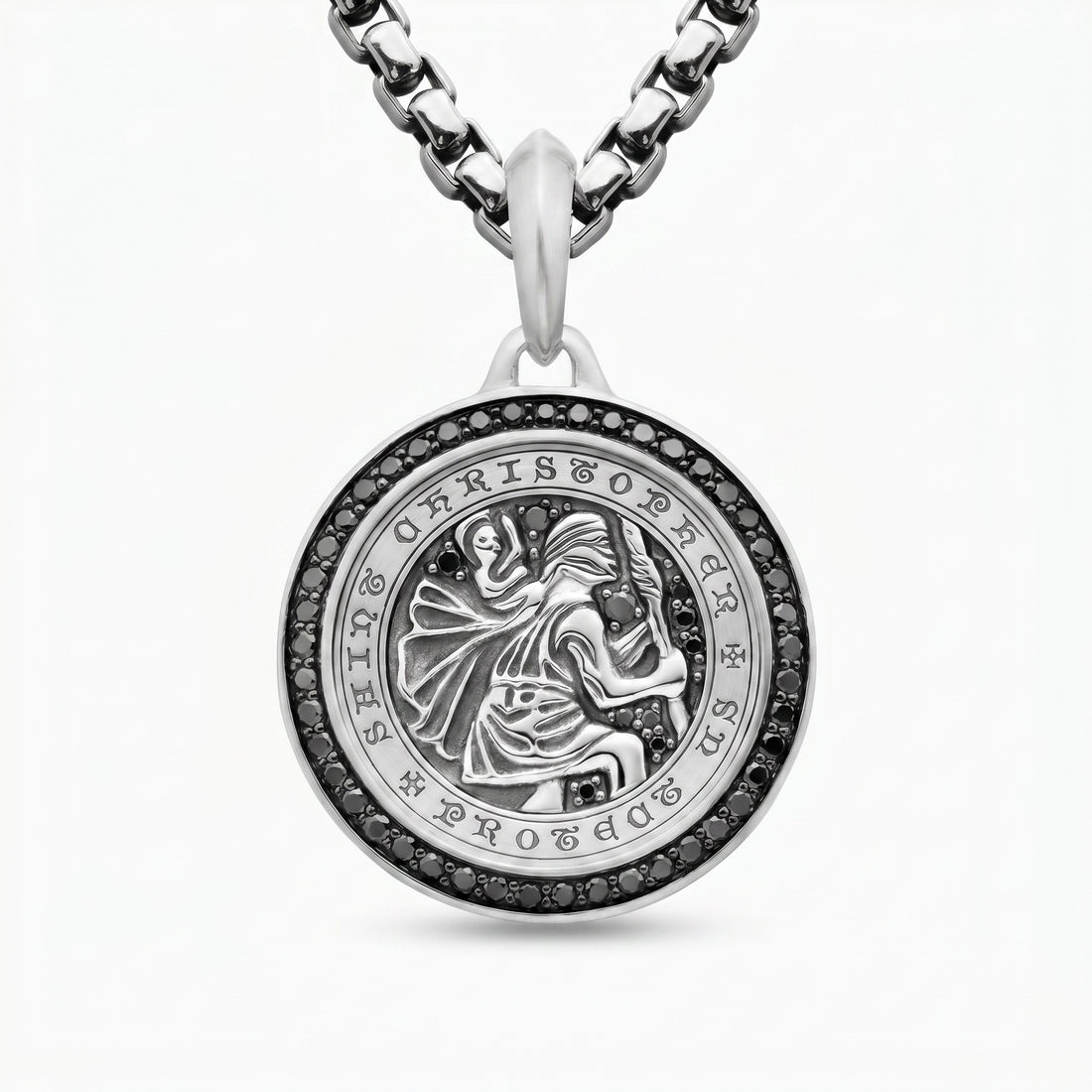 Silver ST. Christopher pendant necklace with intricate design on a white background