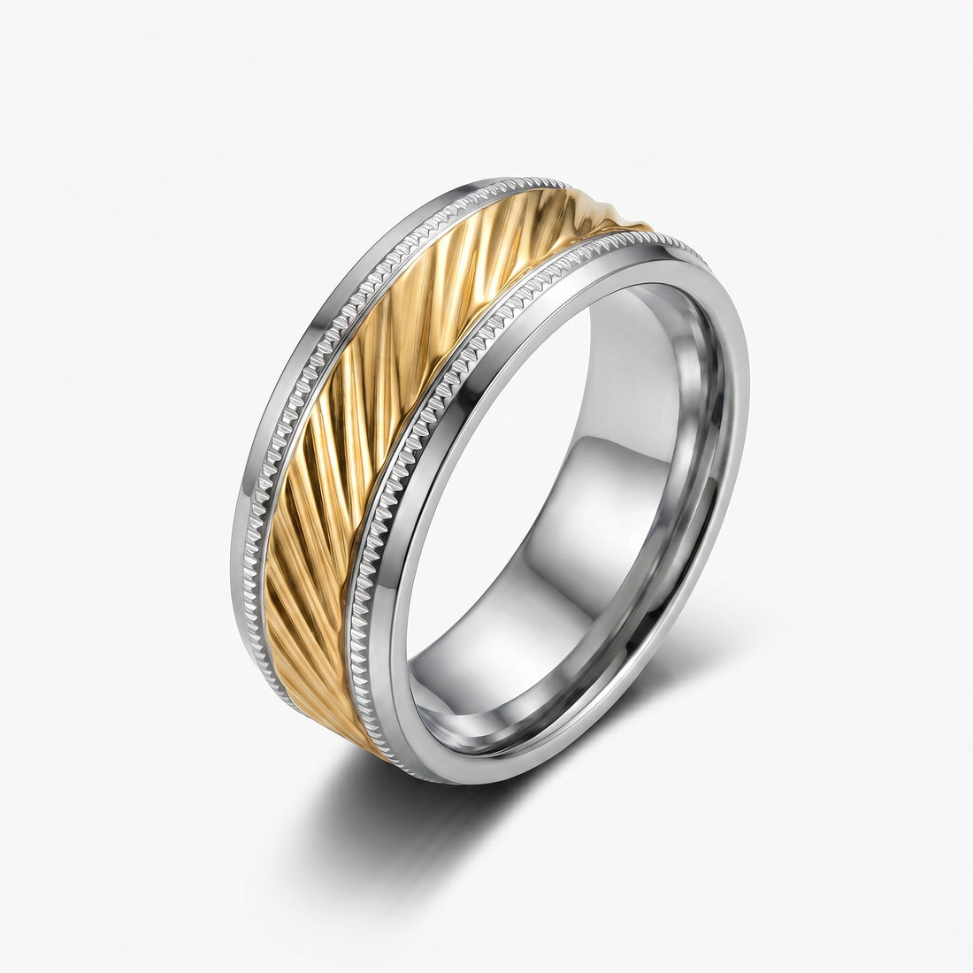 Two-tone ring with gold and silver design on a white background