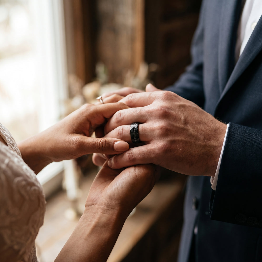 Close-up of two hands holding each other with a blurred background